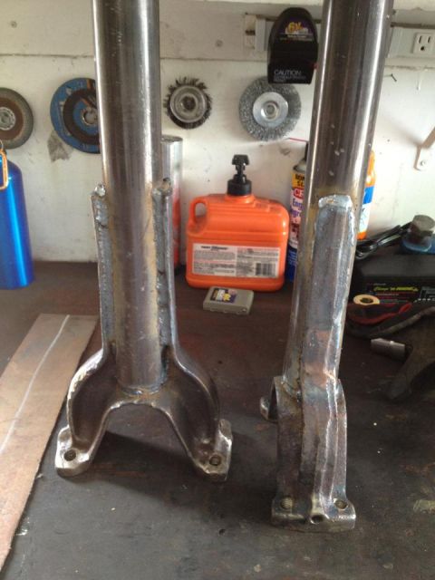 1971 Ford Bronco - Custom radius arms are shown on a workbench, possibly for a Ford Bronco.