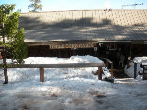 1971 Ford Bronco - Exterior view of Uncle Tom's Cabin building during winter, with snow covering the ground.