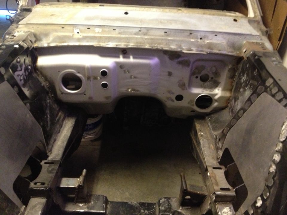 65 Mustang firewall holes filled and sanded