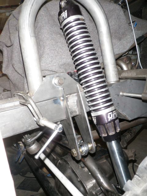 1961 International Scout 800 - Custom suspension component an ORI STRUTS shock absorber and fabricated linkage.