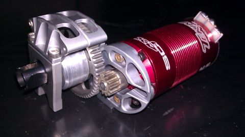 1996 Ford Bronco - Close-up of an RC car's electric motor and transmission assembly.
