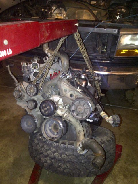 1995 Ford Bronco - Engine removal in progress for a 1995 Ford Bronco.