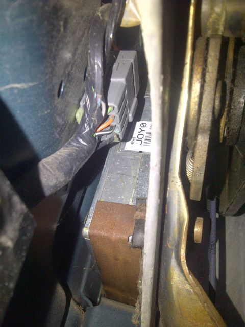 1995 Ford Bronco - Automotive electronic control unit with wiring harness, possibly part of an engine swap.