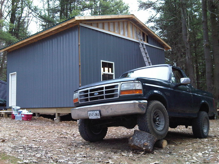 1995 Ford Bronco front grille and bumper, dark color