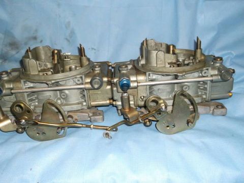 1971 Ford Ranchero - A pair of carburetors are shown on a blue cloth background.