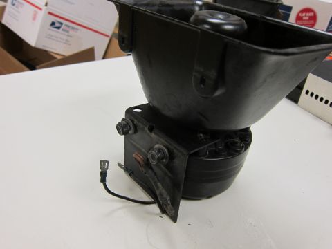 2001 Ford Crown Victoria - A black siren speaker is shown mounted on a bracket with exposed wires.