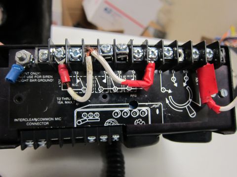 2001 Ford Crown Victoria - Wiring and connection points on a siren control box, with labels indicating usage and power.