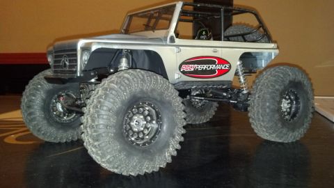 1993 Toyota 4Runner - RC rock crawler with large, aggressive tires and a roll cage.