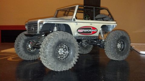1993 Toyota 4Runner - This is a remote control rock crawler truck with oversized tires and a roll cage.