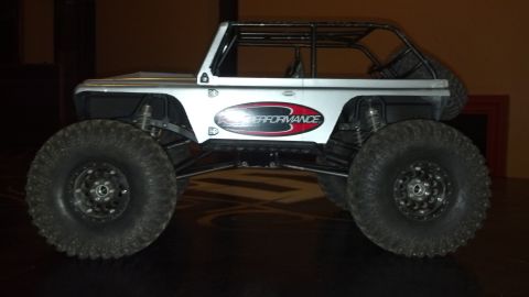 1993 Toyota 4Runner - This RC rock crawler has a custom roll cage and oversized tires for off-road use.