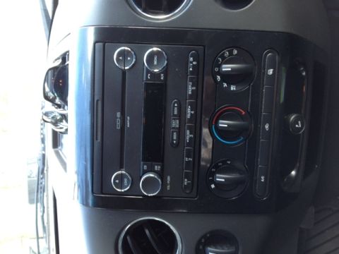 2008 Ford F-150 - Center console of a 2008 Ford F-150, the radio and HVAC controls.