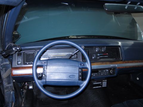1991 Ford LTD Crown Victoria - Interior view of a 1991 Ford Crown Victoria LTD, highlighting the dashboard and controls.