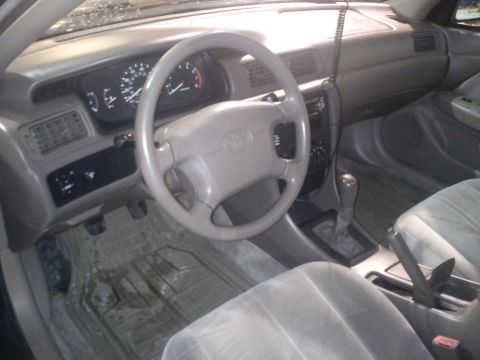 1998 Toyota Camry - Interior view of a 1998 Toyota Camry, the dashboard and front seats.