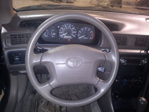 1998 Toyota Camry - Interior view of a 1998 Toyota Camry, highlighting the dashboard and steering wheel.