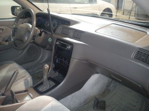 1998 Toyota Camry - Interior view of a 1998 Toyota Camry, showing the dashboard, steering wheel, and center console.