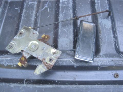 1993 Ford Bronco - Door latch mechanism and handle assembly, likely for a vehicle door.