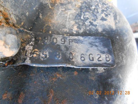 1986 Ford Bronco - Stamped identification numbers on a vehicle part, possibly from a rear end swap.