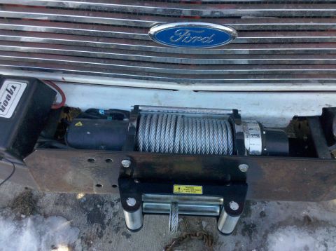 1979 Ford Bronco - This Ford Bronco has a winch installed on its front end, with a visible Ford badge on the grille.