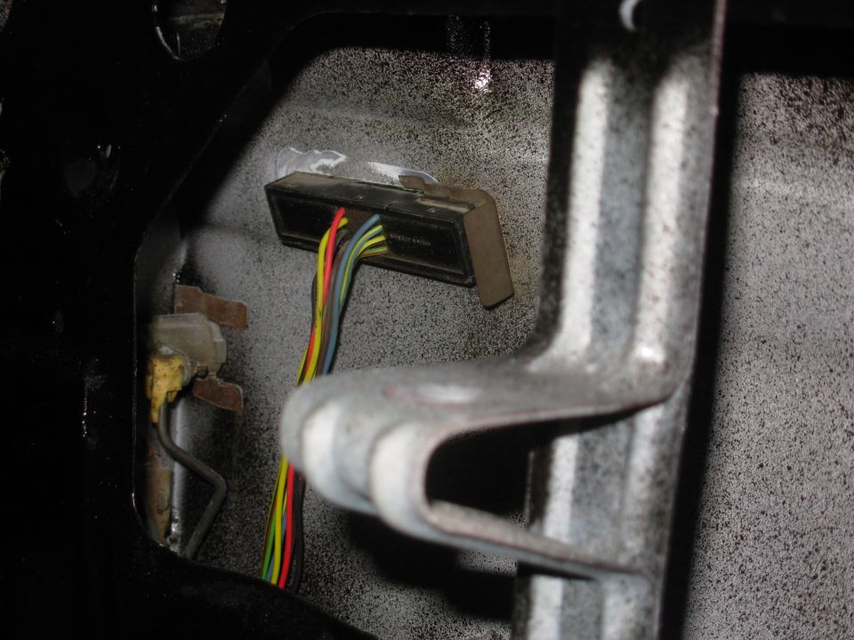 After painting the cut edges & allowing it to dry, I installed the pad just as it was designed to be, with a thin film of silicone grease on its foam gasket to prevent it from adhering to the fresh paint.