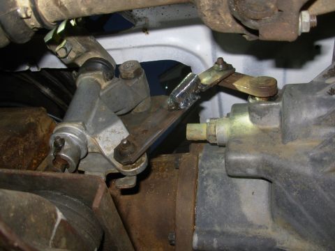 1983 Ford Bronco - I cut the '93 E4OD t-case shifter pushrod and welded it back together shorter (too short, which is why I had to add some back). I may still…