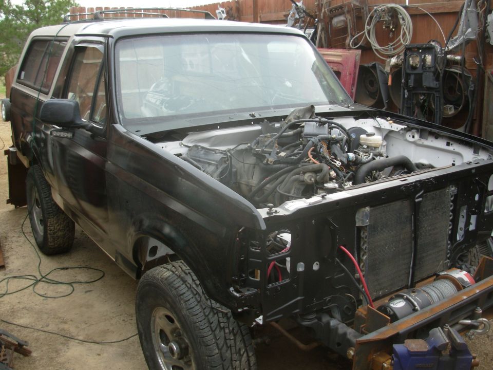 Just getting the fenders out of the way temporarily.

That's the '93 engine bay wiring harness piled on the engine.  I haven't even started on its mods...