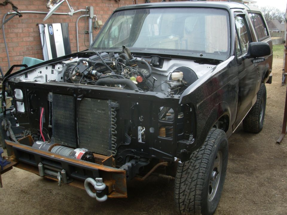 Just getting the fenders out of the way temporarily.

That's the '93 engine bay wiring harness piled on the engine.  I haven't even started on its mods...