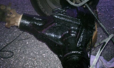 1995 Ford Bronco - Close-up of a freshly painted rear axle assembly, likely for a truck or SUV.