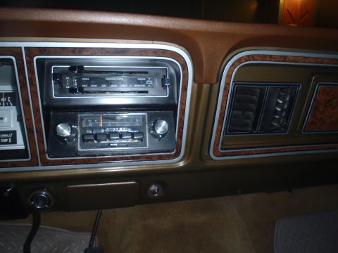 1979 Ford Bronco - Interior view of a 1979 Ford Bronco dashboard, showing the radio and climate controls.