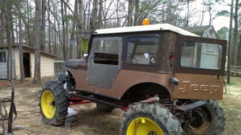 1978 Ford Bronco - This heavily modified Jeep features oversized tires and a custom body, suggesting it's built for off-road use.