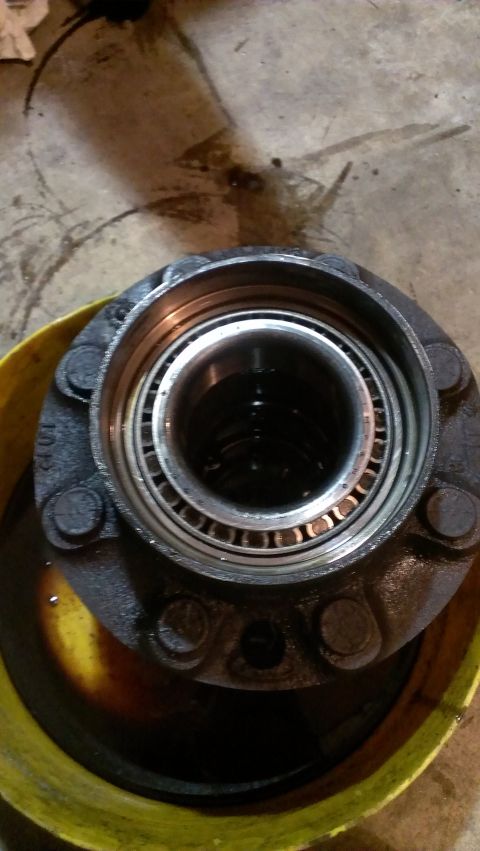 1995 Ford Bronco - A close-up view of a vehicle's wheel hub assembly, likely undergoing maintenance or repair.