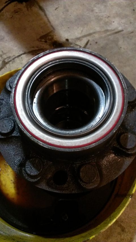 1995 Ford Bronco - Close-up of a wheel hub assembly, showing the bearing and mounting bolts. The "supermotors.net" watermark is visible.