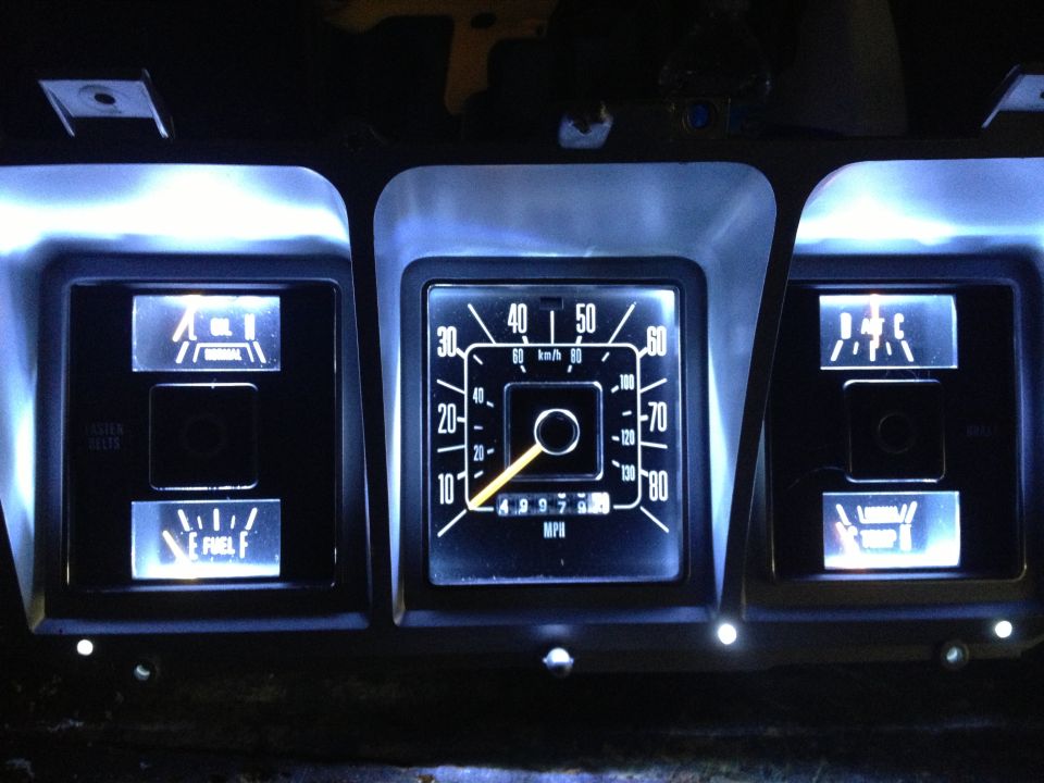 1979 Ford F-350 dashboard gauges with illuminated speedometer, fuel, and oil indicators