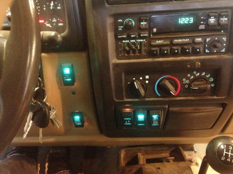 2000 Jeep Wrangler - Dashboard of a 2000 Jeep TJ with auxiliary switches installed.