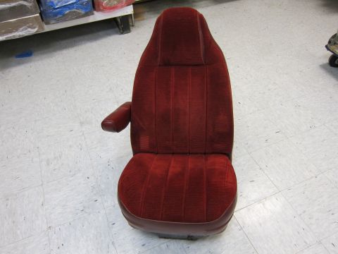 1991 Ford LTD Crown Victoria - This red velour bucket seat features an armrest and ribbed upholstery, likely a replacement part for a vehicle interior.