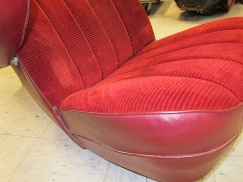 1991 Ford LTD Crown Victoria - A red velour car seat with burgundy vinyl trim is shown from the side.