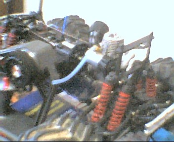 1980 Ford Bronco - RC car nitro engine and suspension detail.