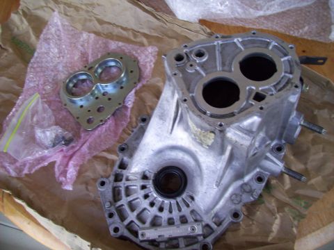 1995 Ford Probe - This photo shows a transmission housing and an adapter plate, not a 1995 Ford Probe.