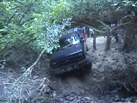 1983 Ford Bronco - This 1983 Ford Bronco is tackling a challenging off-road course.