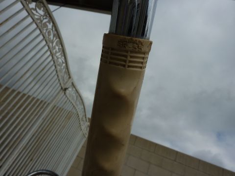 1900 Yugo GVX - Tan grip on a metal rod shows "JAPAN SR-55" text.
