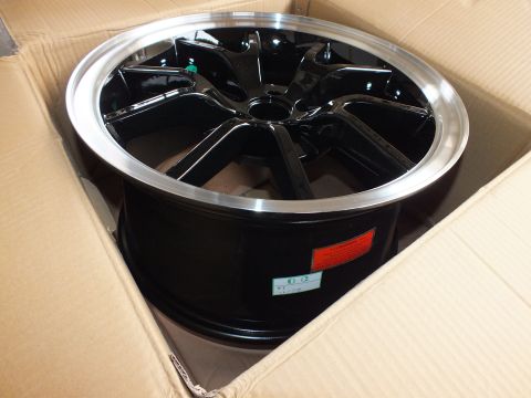 2003 Ford Crown Victoria - Six-spoke gloss black alloy wheel with machined lip and orange warning sticker packed in a carton