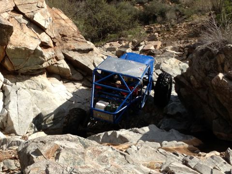 1966 Ford Bronco - Custom off-road buggy tackles challenging rocky terrain.