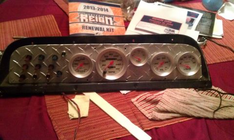1969 Ford F-250 - Custom gauge cluster with various gauges and switches, not a 1969 Ford F-250.