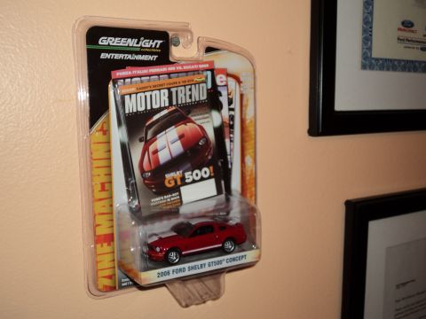 2004 Mercury Grand Marquis - A Greenlight die-cast model of a 2006 Ford Shelby GT500 Concept is displayed with a Motor Trend magazine.