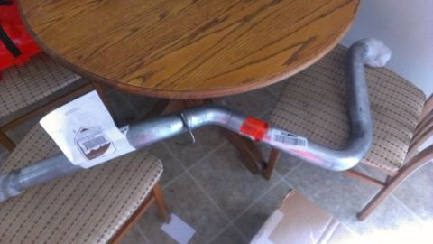 1990 Ford Bronco - An exhaust pipe is shown, not a 1990 Ford Bronco.