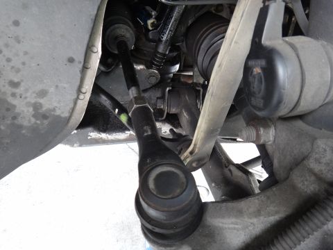 2000 Lincoln Continental - Front suspension and steering linkage parts shown in detail.