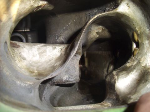 1995 Ford Probe - Close-up view of the interior of an engine intake manifold.