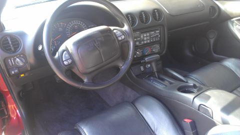 1979 Chevrolet Camaro - Interior view of a car, showing the dashboard, steering wheel, and seats.