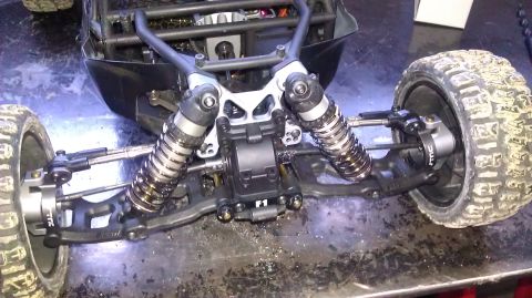1996 Ford Bronco - The detailed suspension and shock absorbers of a remote control car are visible.