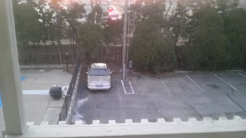 2000 Mercury Grand Marquis - A silver sedan is parked in an outdoor lot, viewed from above.