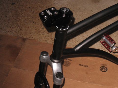 1994 Ford Bronco - The image shows a close-up view of bicycle components, including the handlebars, stem, and front fork.